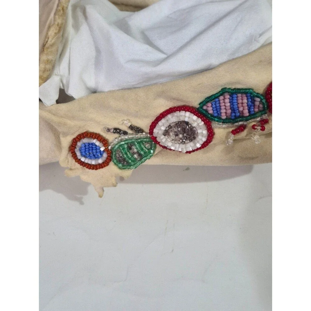 Vintage Crow Beaded Hide Moccasins featuring Intricate Colorful Glass Beadwork